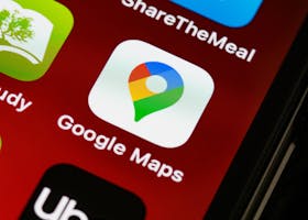 Detailed view of Google Maps app icon on a smartphone screen, showcasing digital navigation technology.